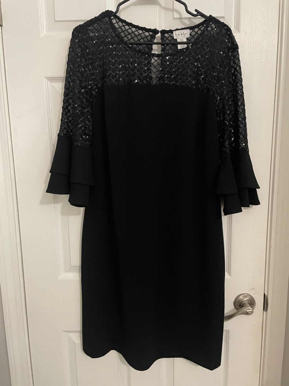 Nicole Miller black cocktail dress with sleeves size 14.